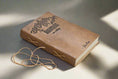 Load image into Gallery viewer, John Muir Quote Leather Journal - "The Mountains Are Calling" Adventure Diary
